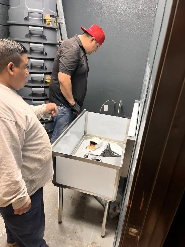 Commercial plumbing and sink installation in Bedford